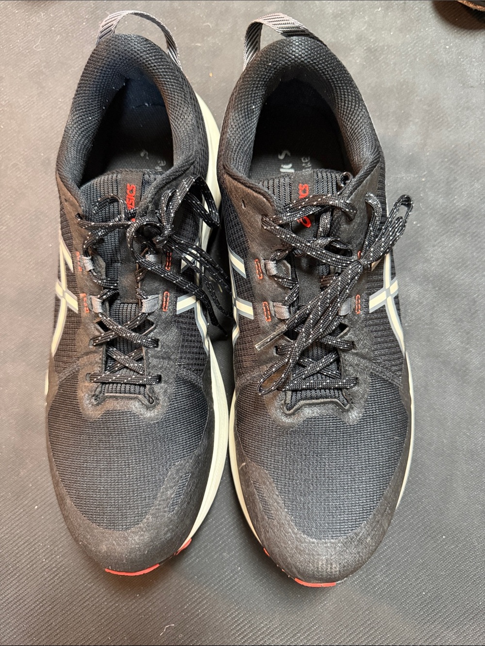 Asics Black Shoes with Cream Midsole and Red Accents